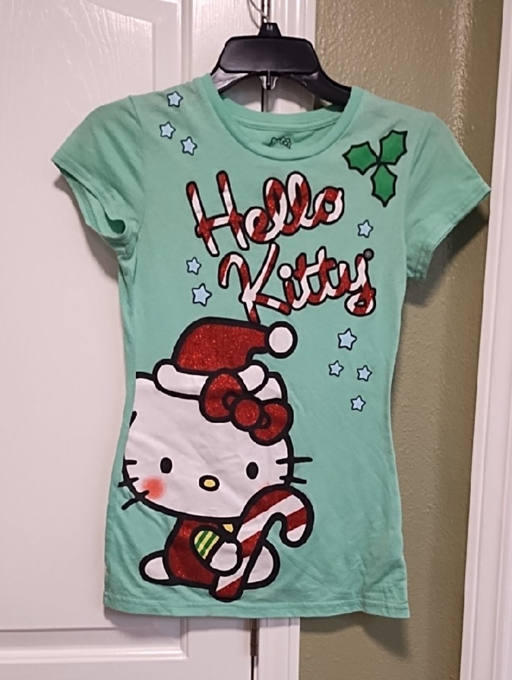 Hello Kitty Mint Green Short Sleeve Holiday Tee with Red Accents